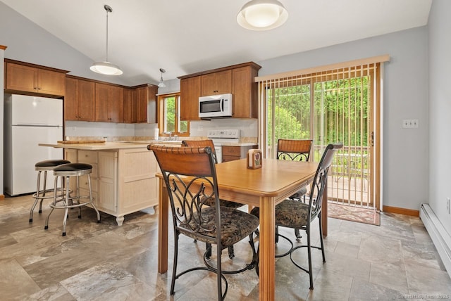 44 Brindlewood Path, Colchester, CT 06415 - dining area with a baseboard radiator, vaulted ceiling, and light stone finish floors