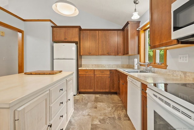 44 Brindlewood Path, Colchester, CT 06415 - kitchen featuring white appliances, stone finish flooring, light countertops, lofted ceiling, and brown cabinetry