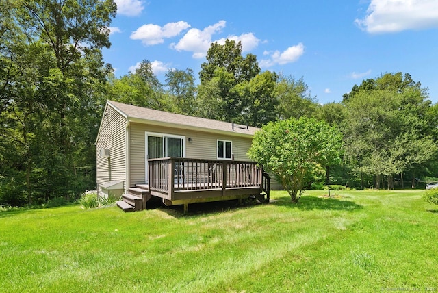 44 Brindlewood Path, Colchester, CT 06415 - back of property with a wooden deck and a yard