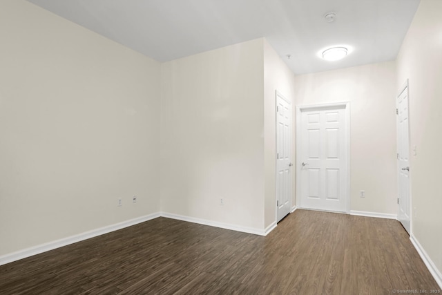 25 Adams Ave Unit 103, Stamford, CT 06902 - empty room featuring dark wood-style floors