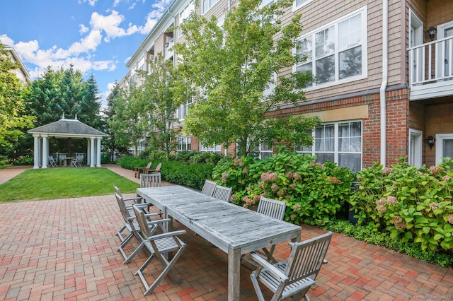 25 Adams Ave Unit 103, Stamford, CT 06902 - view of patio featuring outdoor dining space and a gazebo