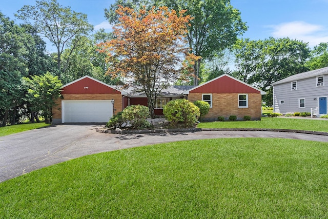 253 Simsbury Rd, West Hartford, CT 06117 - single story home featuring driveway, a garage, brick siding, and a front yard