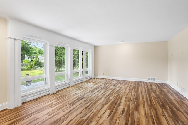 253 Simsbury Rd, West Hartford, CT 06117 - spare room with plenty of natural light and wood finished floors