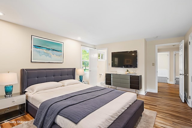 253 Simsbury Rd, West Hartford, CT 06117 - bedroom with wood finished floors and recessed lighting
