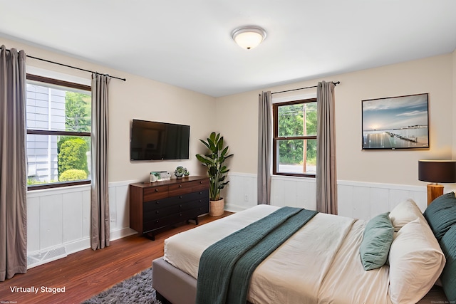253 Simsbury Rd, West Hartford, CT 06117 - bedroom featuring wood finished floors and wainscoting