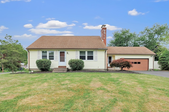 66 Bridgeport Ave, Bristol, CT 06010 - view of front of property with a chimney, driveway, an attached garage, and a front yard