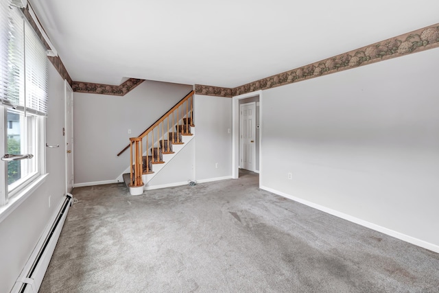66 Bridgeport Ave, Bristol, CT 06010 - unfurnished living room with baseboard heating, stairway, and carpet