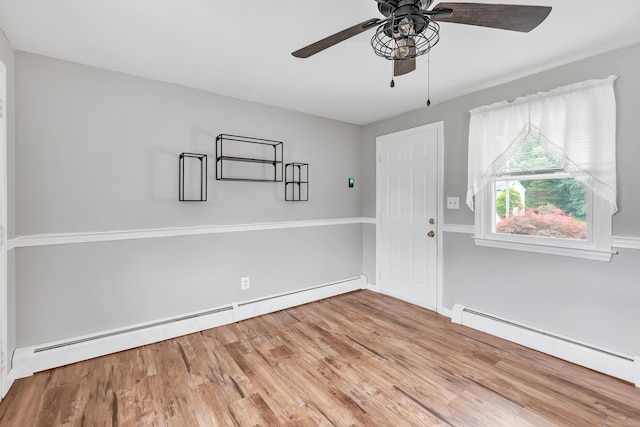 66 Bridgeport Ave, Bristol, CT 06010 - foyer with a baseboard radiator, a ceiling fan, and wood finished floors