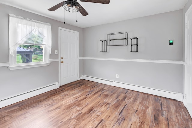 66 Bridgeport Ave, Bristol, CT 06010 - foyer entrance with a ceiling fan, a baseboard radiator, and wood finished floors