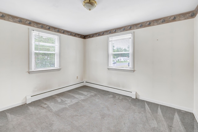 66 Bridgeport Ave, Bristol, CT 06010 - carpeted empty room with plenty of natural light and baseboard heating