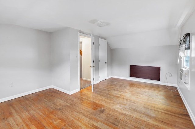 66 Bridgeport Ave, Bristol, CT 06010 - additional living space with wood finished floors and vaulted ceiling