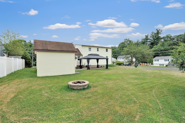 66 Bridgeport Ave, Bristol, CT 06010 - view of yard featuring a gazebo, a fire pit, and an outdoor structure