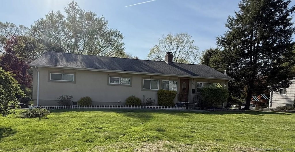 161 Laurel Ter, Cheshire, CT 06410 - ranch-style home with a chimney, a front yard, and stucco siding