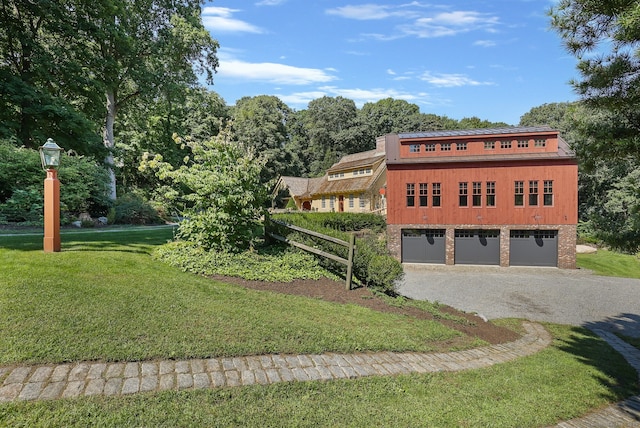44 Brook St, Groton, CT 06340 - view of side of property with a garage, gravel driveway, a lawn, and brick siding