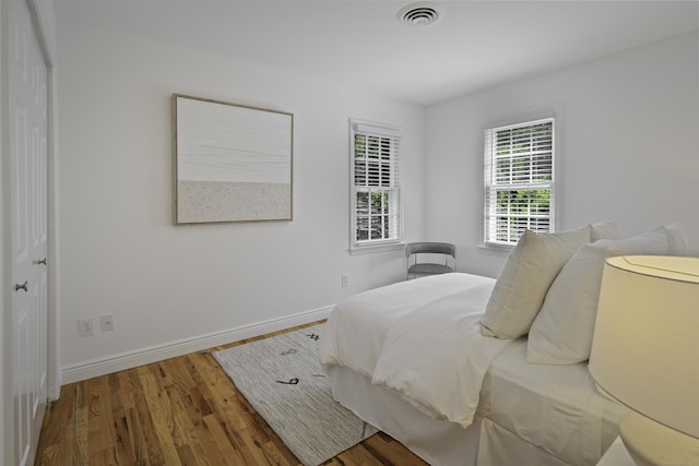 70 Fitch Ln, New Canaan, CT 06840 - bedroom featuring wood finished floors and baseboards
