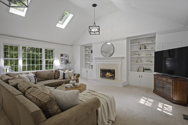 70 Fitch Ln, New Canaan, CT 06840 - living area with a skylight, built in shelves, healthy amount of natural light, a high end fireplace, and high vaulted ceiling