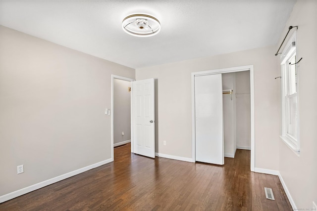 8 Rain Dance Cir, Naugatuck, CT 06770 - unfurnished bedroom with wood finished floors and a closet