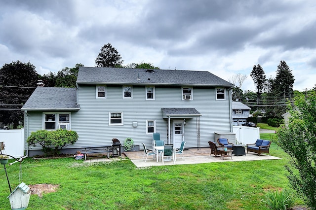 16 Kenwood Rd, Meriden, CT 06450 - back of property featuring a patio, a fire pit, and a shingled roof