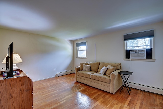 16 Kenwood Rd, Meriden, CT 06450 - living room featuring a baseboard radiator, light wood-style floors, and cooling unit