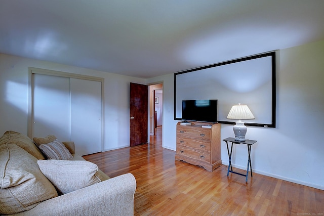 16 Kenwood Rd, Meriden, CT 06450 - living room featuring light wood-style flooring and baseboards