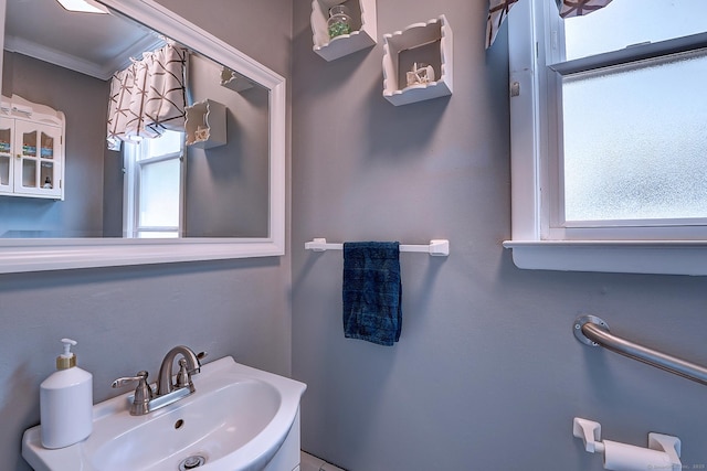 16 Kenwood Rd, Meriden, CT 06450 - bathroom with a sink and ornamental molding