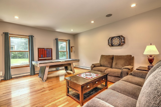 330 Webb Cir, Monroe, CT 06468 - living area with baseboard heating, light wood-style flooring, healthy amount of natural light, recessed lighting, and a baseboard radiator