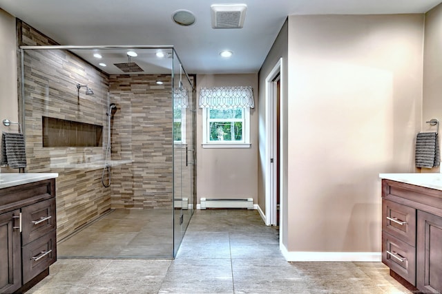 330 Webb Cir, Monroe, CT 06468 - bathroom featuring a baseboard radiator, vanity, a stall shower, recessed lighting, and a baseboard heating unit