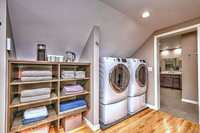 330 Webb Cir, Monroe, CT 06468 - laundry room with wood finished floors and washing machine and clothes dryer