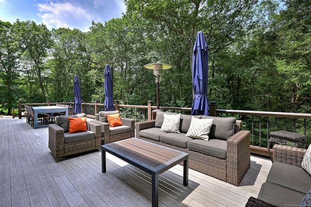 330 Webb Cir, Monroe, CT 06468 - wooden deck with an outdoor hangout area, outdoor dining space, and view of wooded area