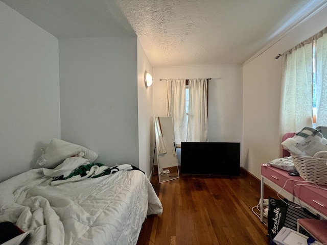 71 Forest Rd, West Haven, CT 06516 - bedroom with wood finished floors and a textured ceiling