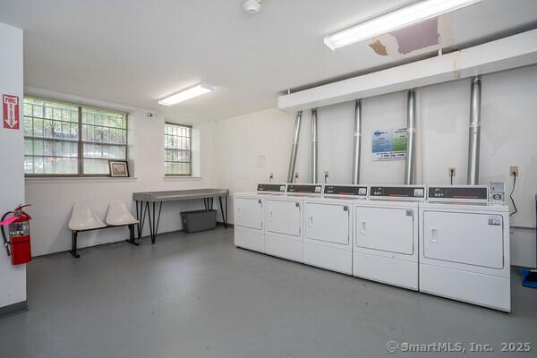 40 Owen St Apt E12, Hartford, CT 06105 - shared laundry featuring washing machine and clothes dryer