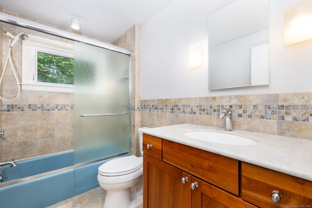 1 Boulder Rd Unit 1, Colchester, CT 06415 - full bath with vanity, tile walls, tile patterned flooring, bath / shower combo with glass door, and wainscoting
