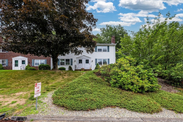 1 Boulder Rd Unit 1, Colchester, CT 06415 - view of front of house with a chimney and a front yard