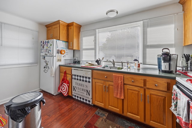 30 Brookside Dr, Southington, CT 06489 - kitchen with white appliances, brown cabinetry, dark wood-type flooring, and dark countertops