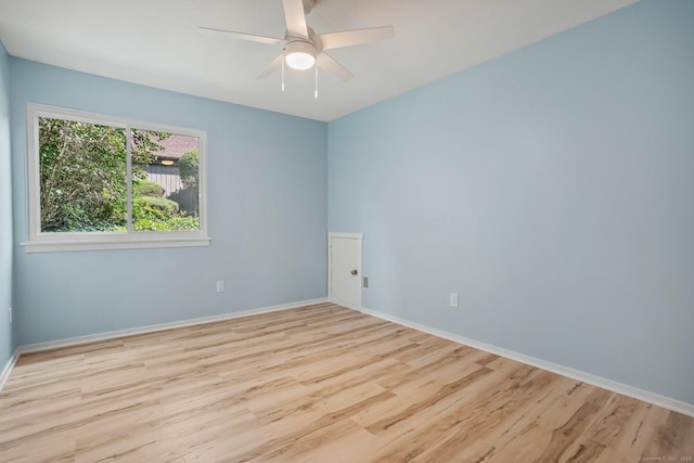 499 Heritage Vlg Unit B, Southbury, CT 06488 - spare room with wood finished floors and a ceiling fan