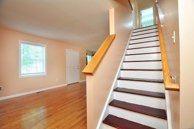 19 Windy Hill Ln Unit 19, Rocky Hill, CT 06067 - stairs featuring plenty of natural light and wood finished floors