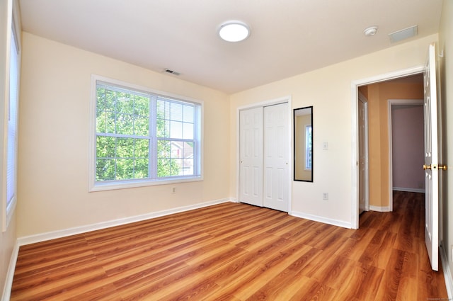 19 Windy Hill Ln Unit 19, Rocky Hill, CT 06067 - unfurnished bedroom with light wood-style floors and a closet