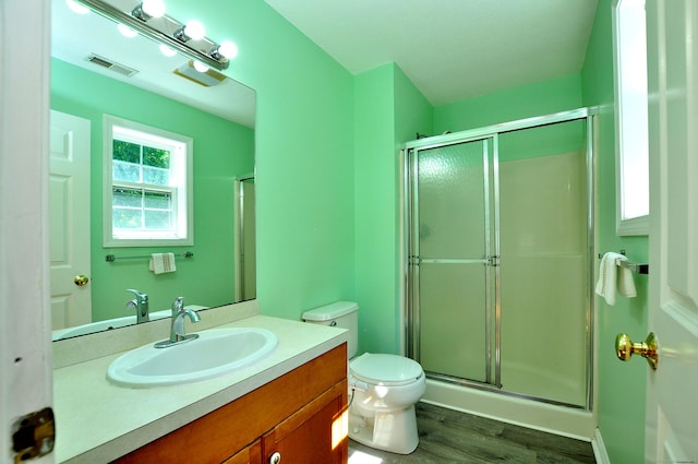 19 Windy Hill Ln Unit 19, Rocky Hill, CT 06067 - bathroom featuring vanity, a shower stall, and wood finished floors