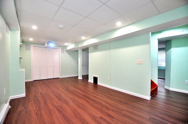 19 Windy Hill Ln Unit 19, Rocky Hill, CT 06067 - finished below grade area with wood finished floors, recessed lighting, stairs, a paneled ceiling, and a baseboard heating unit