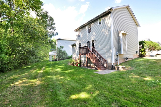 19 Windy Hill Ln Unit 19, Rocky Hill, CT 06067 - rear view of house featuring a lawn and stairs