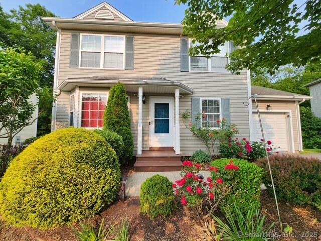 19 Windy Hill Ln Unit 19, Rocky Hill, CT 06067 - traditional-style home featuring an attached garage