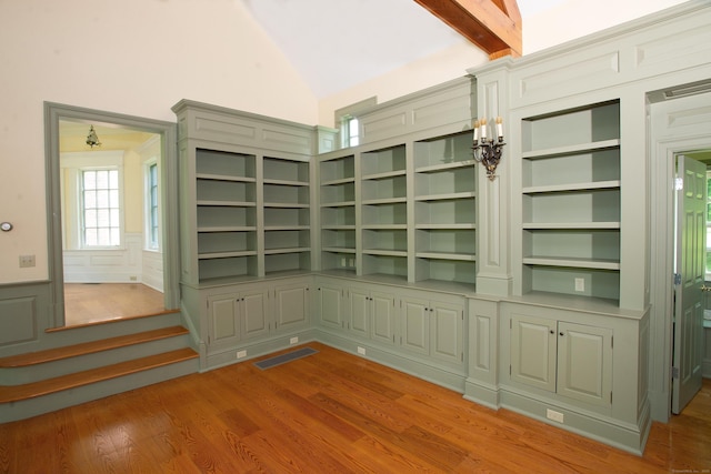 873 N Salem Rd, Ridgefield, CT 06877 - unfurnished dining area with wood finished floors, lofted ceiling, wainscoting, and built in features