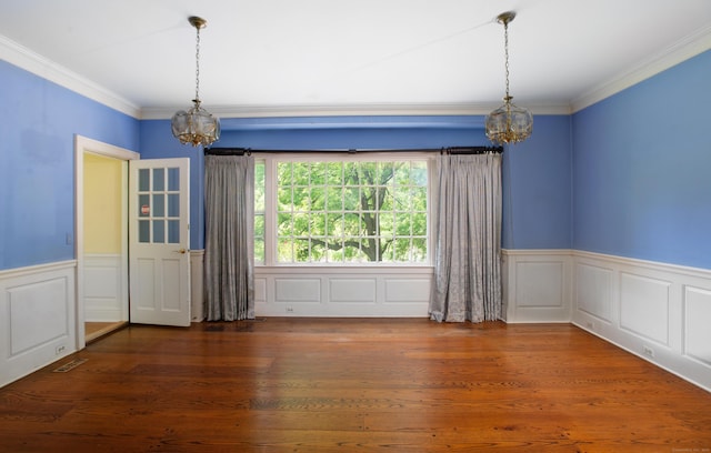 873 N Salem Rd, Ridgefield, CT 06877 - unfurnished dining area with a chandelier, ornamental molding, a wainscoted wall, wood finished floors, and a decorative wall