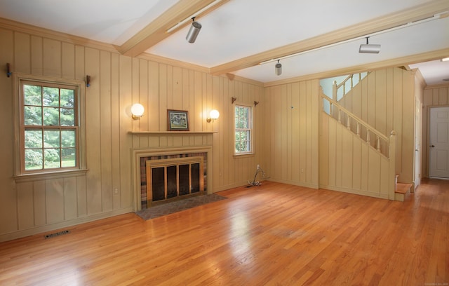 873 N Salem Rd, Ridgefield, CT 06877 - unfurnished living room with beam ceiling, wood finished floors, stairs, a fireplace, and ornamental molding