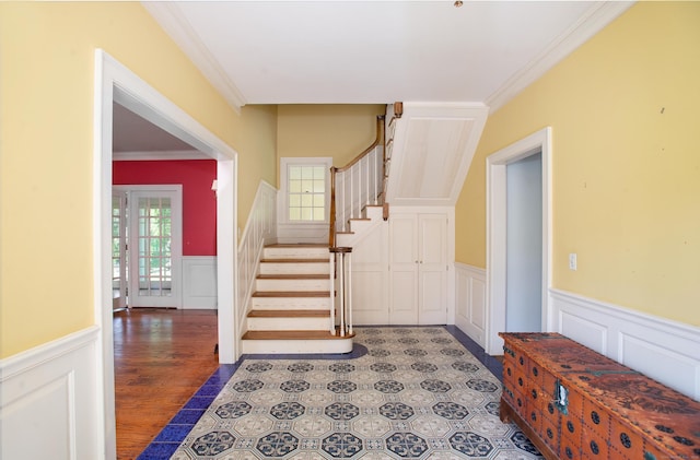 873 N Salem Rd, Ridgefield, CT 06877 - foyer entrance with a wainscoted wall, a decorative wall, ornamental molding, stairs, and wood finished floors