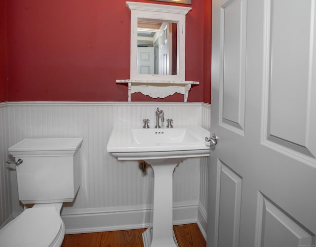 873 N Salem Rd, Ridgefield, CT 06877 - bathroom with a wainscoted wall and wood finished floors