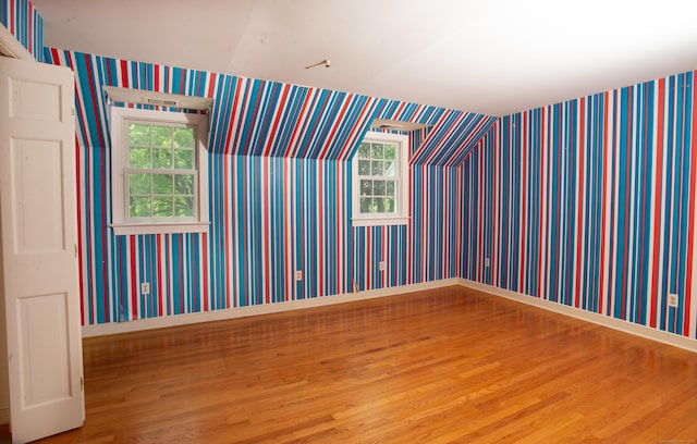 873 N Salem Rd, Ridgefield, CT 06877 - unfurnished room featuring wood finished floors, healthy amount of natural light, and wallpapered walls