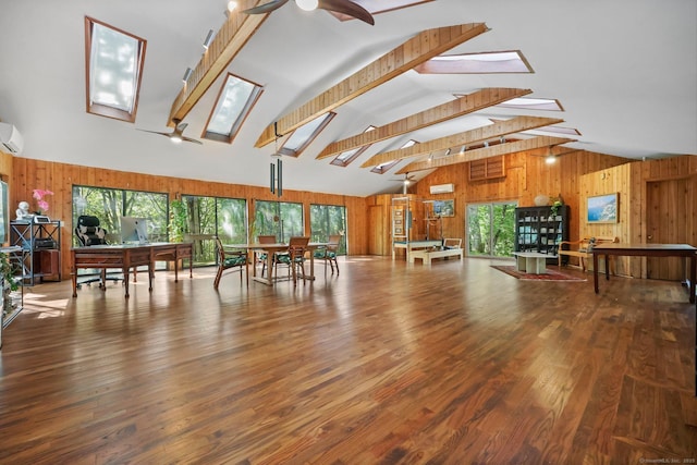 22 Blackberry Dr E, Stamford, CT 06903 - miscellaneous room featuring wood walls, a skylight, plenty of natural light, an AC wall unit, and beam ceiling