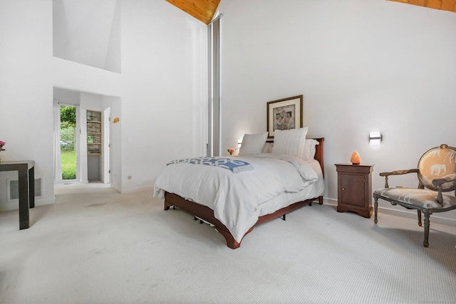 22 Blackberry Dr E, Stamford, CT 06903 - carpeted bedroom featuring high vaulted ceiling and baseboards