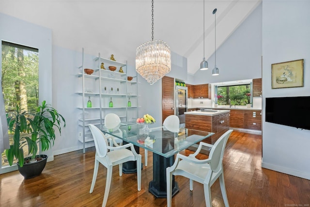 22 Blackberry Dr E, Stamford, CT 06903 - dining space with high vaulted ceiling, a chandelier, and dark wood-style floors